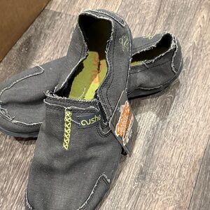 Cushe womens Black Moccasins with Green Accents